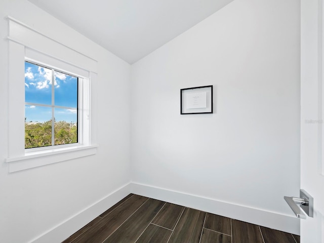 unfurnished room featuring dark hardwood / wood-style floors