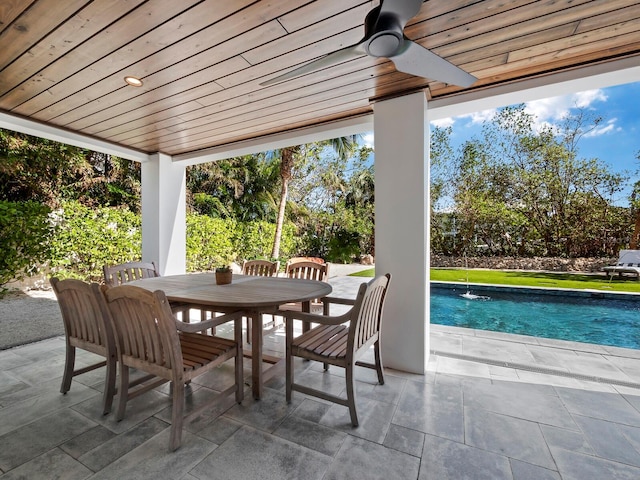 view of patio featuring ceiling fan