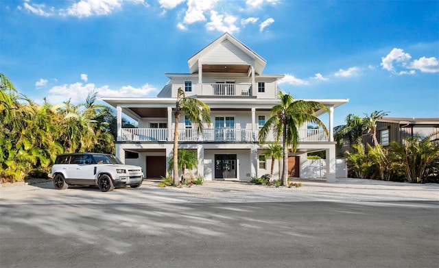 coastal inspired home featuring a balcony