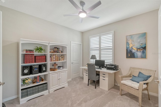 office with ceiling fan and light colored carpet