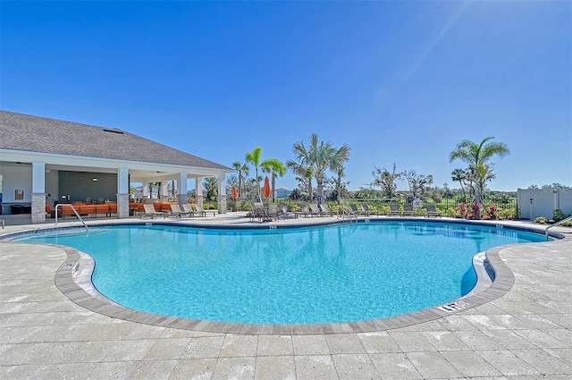 view of swimming pool with a patio