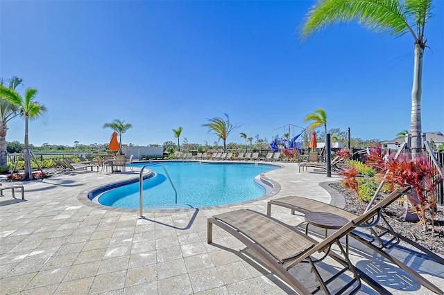 view of swimming pool featuring a patio