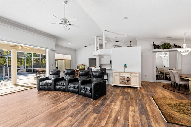 living room featuring lofted ceiling, dark hardwood / wood-style flooring, a textured ceiling, and crown molding