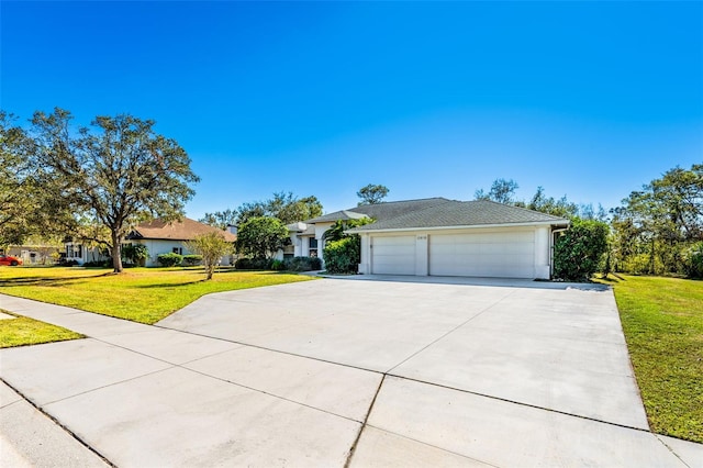 ranch-style house with a front yard and a garage