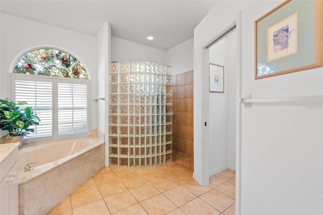 bathroom featuring separate shower and tub and tile patterned flooring