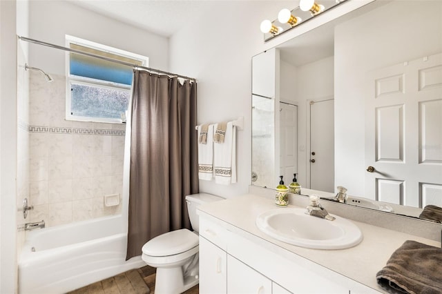 full bathroom featuring hardwood / wood-style floors, vanity, toilet, and shower / bathtub combination with curtain