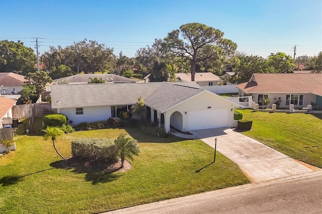 ranch-style house with a front lawn and a garage