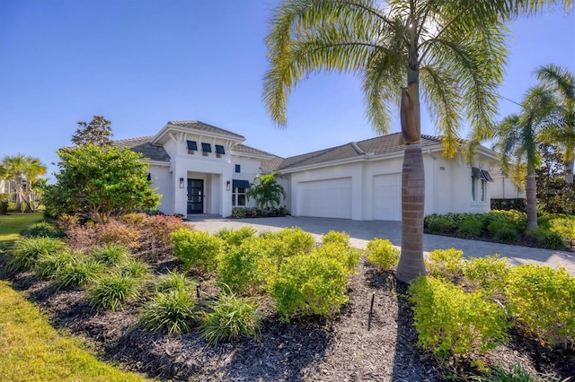 mediterranean / spanish-style house featuring a garage