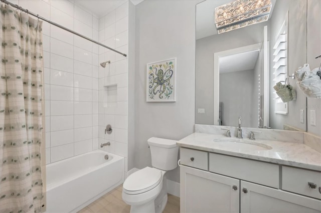 full bathroom with vanity, toilet, and shower / tub combo with curtain