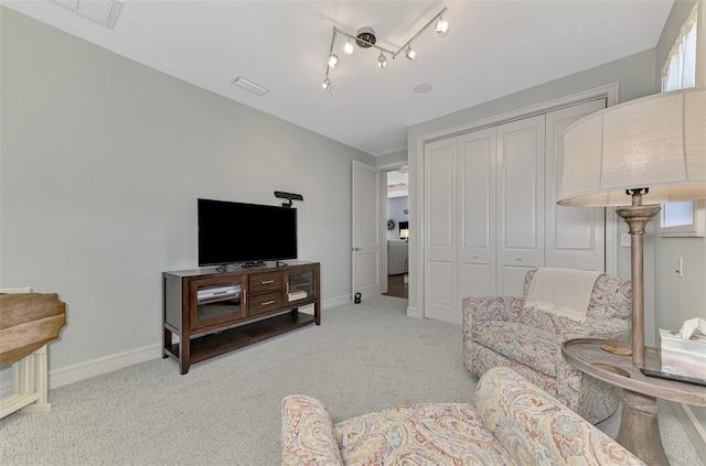 living room featuring light colored carpet