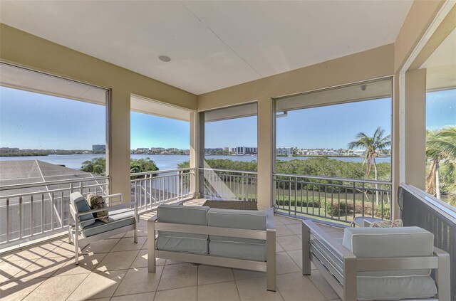 sunroom with a water view