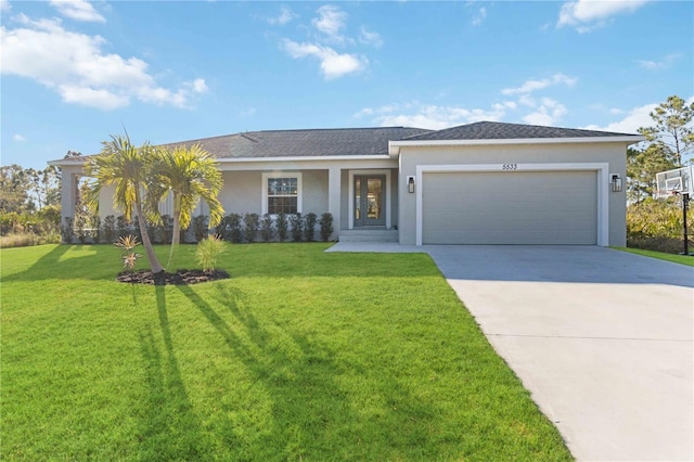 view of front facade featuring a garage and a front yard