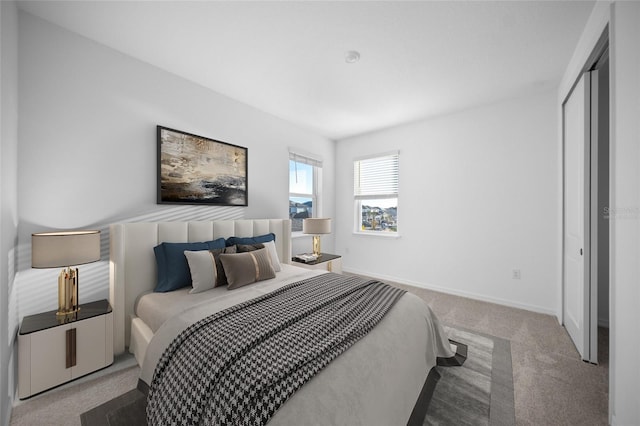 bedroom featuring light carpet and a closet