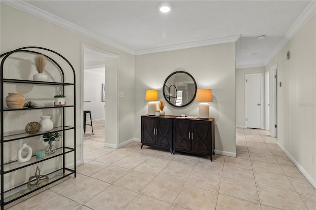 corridor featuring light tile patterned floors and crown molding