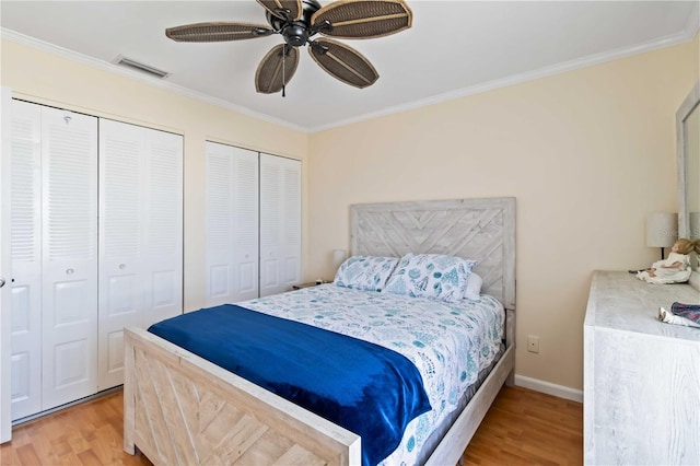 bedroom featuring ceiling fan, wood-type flooring, and ornamental molding