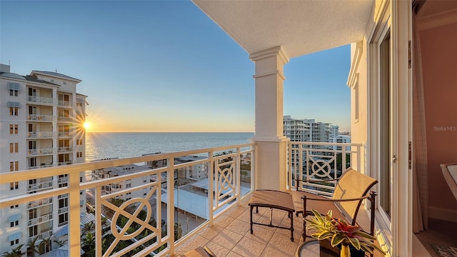 balcony at dusk with a water view