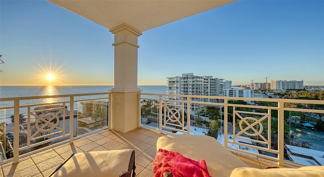 balcony at dusk with a water view