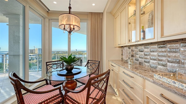 dining space with a chandelier and a wealth of natural light