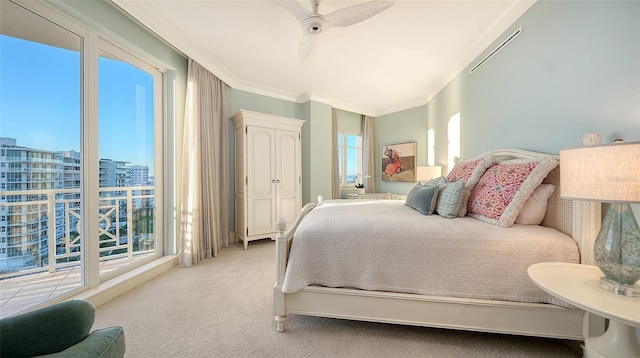 bedroom with ceiling fan, crown molding, and light colored carpet