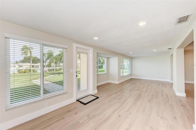 interior space with light hardwood / wood-style floors