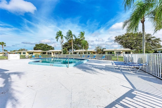 view of pool featuring a patio