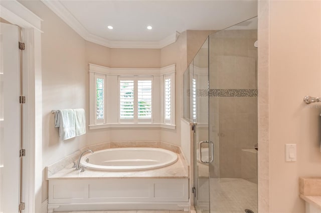 bathroom with shower with separate bathtub and crown molding