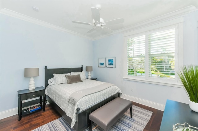 bedroom with multiple windows, ceiling fan, dark wood-type flooring, and ornamental molding