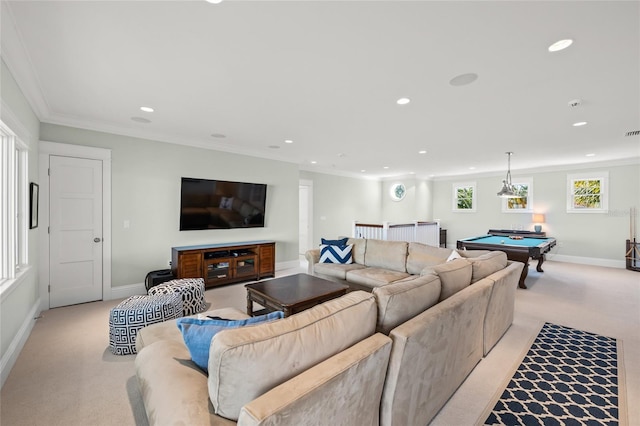 living room featuring ornamental molding, light carpet, and pool table