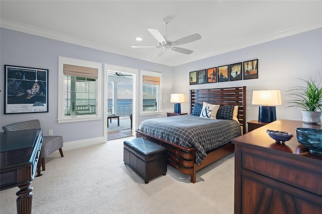 carpeted bedroom with access to exterior, ceiling fan, and ornamental molding