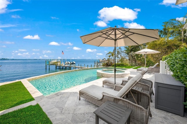 view of swimming pool with a boat dock, a patio area, a water view, and an in ground hot tub