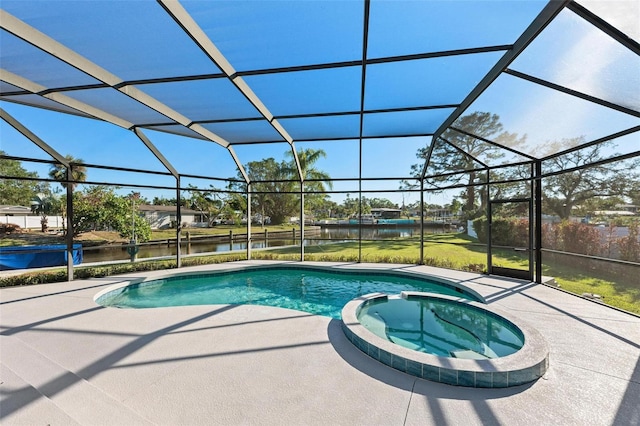 view of pool featuring an in ground hot tub, a patio, a water view, and a lanai