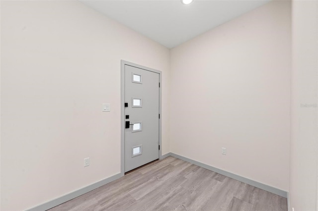 608 69th Ave W, Bradenton, FL 34207 - foyer entrance with light wood-style floors and recessed lighting