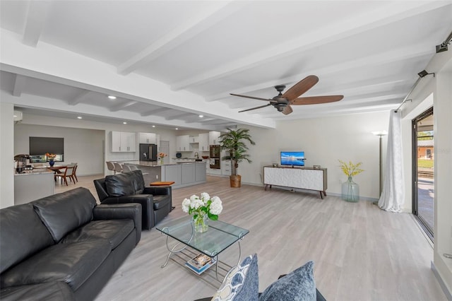 608 69th Ave W, Bradenton, FL 34207 - living area featuring beamed ceiling, light wood-style floors, a ceiling fan, and recessed lighting