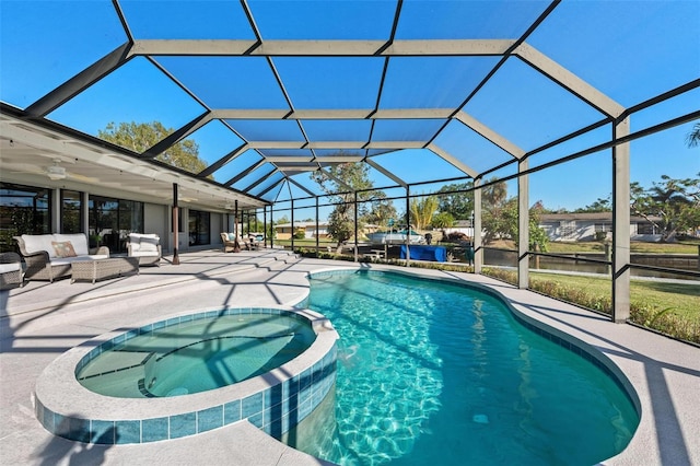 view of swimming pool with glass enclosure, an outdoor living space, an in ground hot tub, and a patio