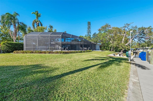 608 69th Ave W, Bradenton, FL 34207 - view of grassy yard with glass enclosure