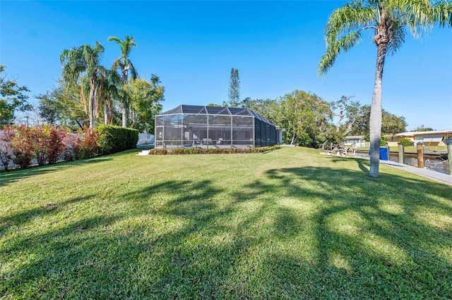 view of yard with a lanai