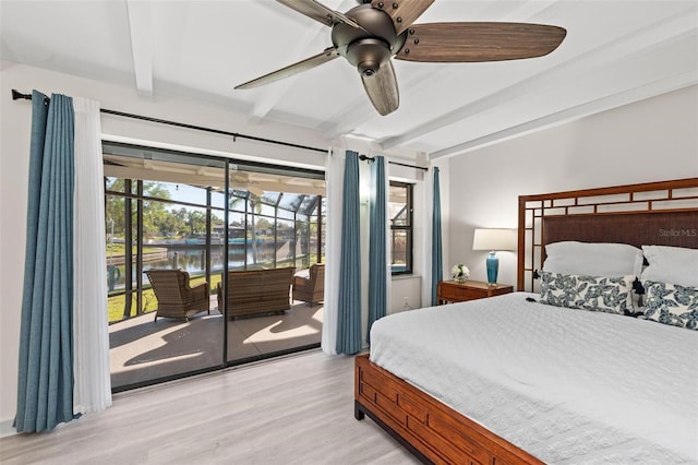 608 69th Ave W, Bradenton, FL 34207 - bedroom featuring beamed ceiling, access to exterior, light wood-type flooring, a water view, and a ceiling fan