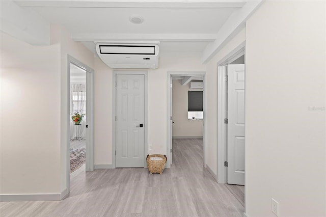 hallway featuring light hardwood / wood-style floors