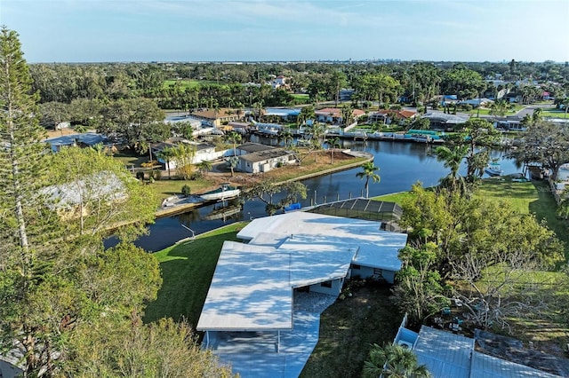 bird's eye view featuring a water view and a residential view