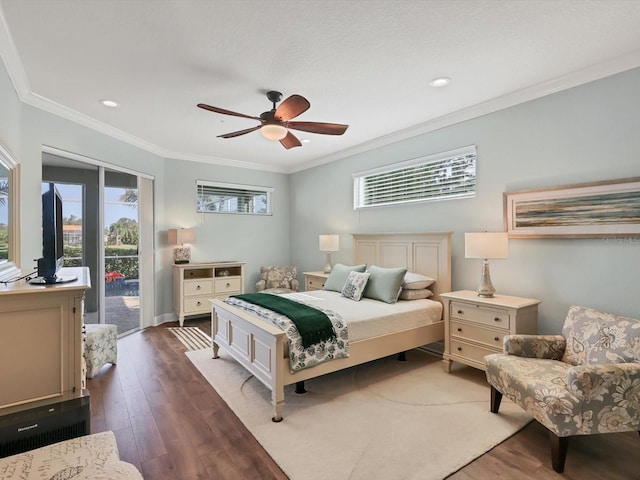 bedroom with access to exterior, dark hardwood / wood-style flooring, ceiling fan, and ornamental molding