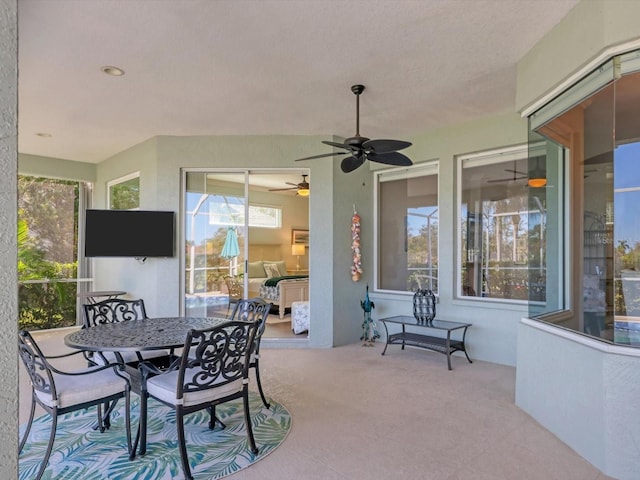 view of patio / terrace featuring ceiling fan