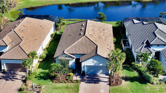 drone / aerial view with a water view