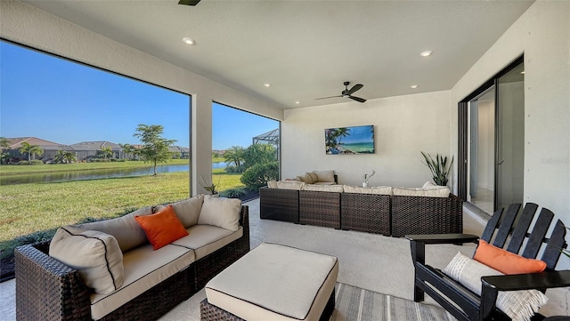 sunroom with ceiling fan