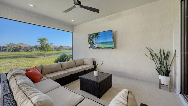 interior space with ceiling fan