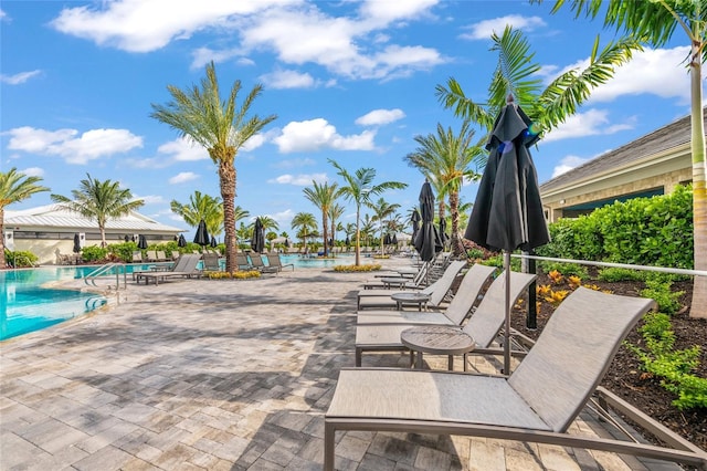 view of patio with a community pool