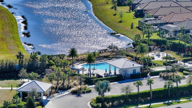 birds eye view of property featuring a water view