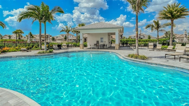 view of swimming pool featuring a patio