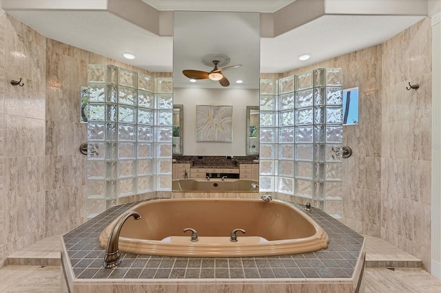 bathroom featuring independent shower and bath, plenty of natural light, and ceiling fan