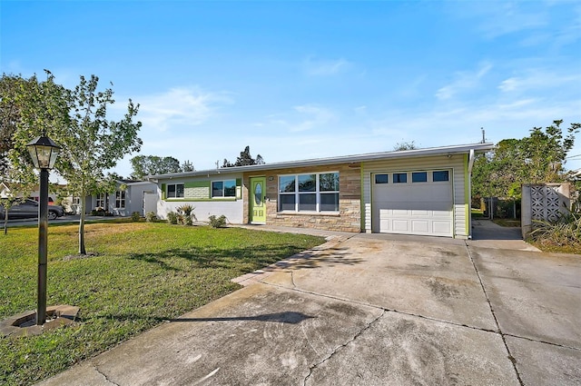 ranch-style house with a front lawn and a garage