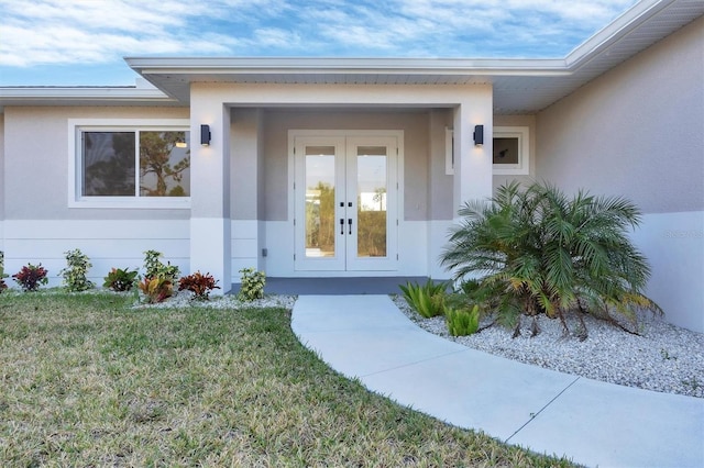 property entrance featuring french doors